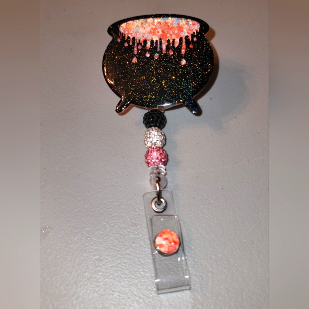 Cauldron badge reel